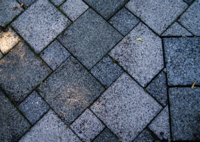 Aged concrete patio paving pattern