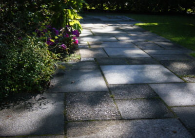 Rustic concrete paving slab garden walkway