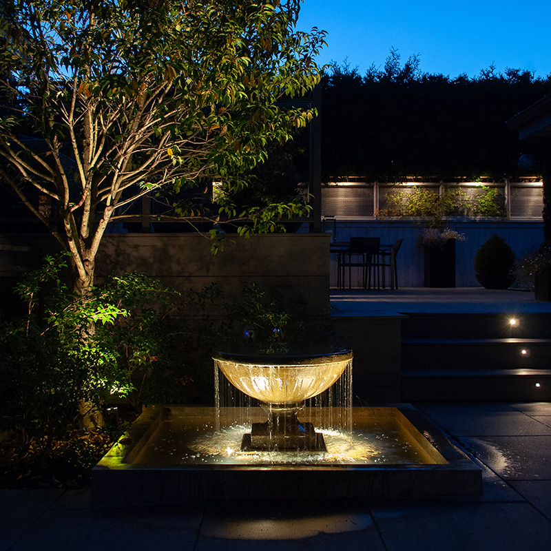 Marpole evening terrace Marpole garden water feature at night