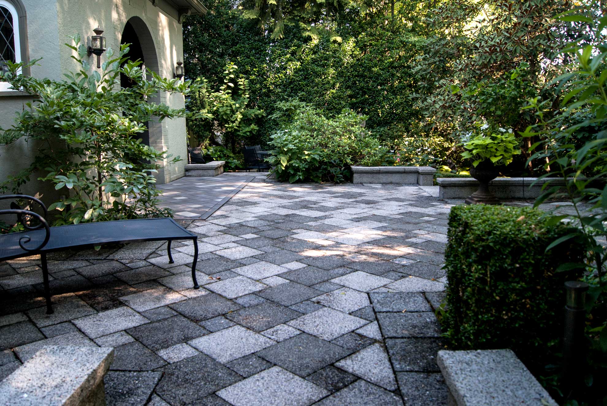 Serene garden terrace with greenery.